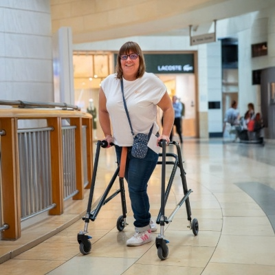 Chloe with her Kaye Walker – RMS mobility aid supporting independence